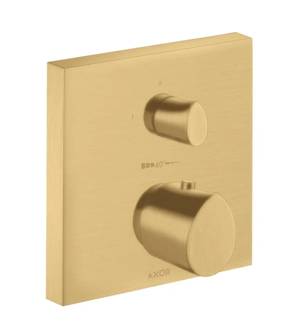 Thermostat in gebürstetem Gold mit zwei runden Reglern auf flacher quadratischer Plakette. Markenlogo "AXOR" sichtbar. Verwendung in Sanitäranlagen möglich.